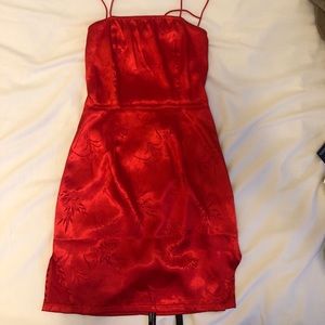 Red satin dress with a slit
